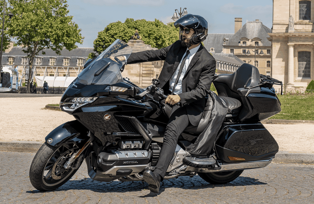 Motorbike taxi service in Paris in front of Les Invalides